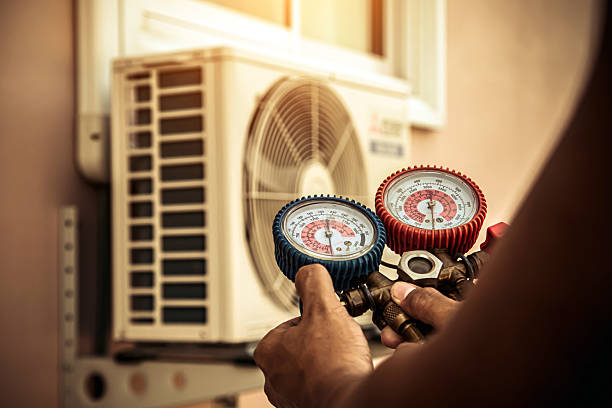 Professional Air Conditioning Service technician working in Elkhart, IN